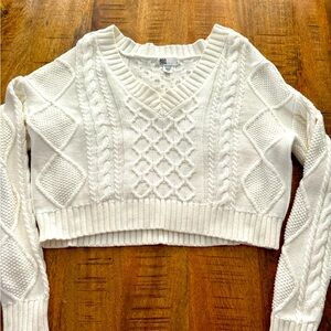 White cropped sweater. V-neck, cable knit. Size S.